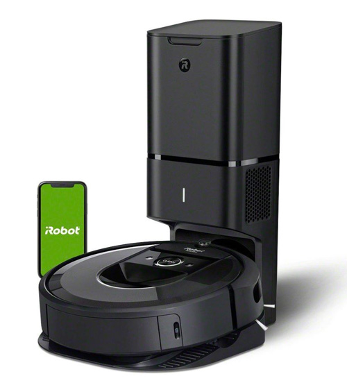 A iRobot Roomba i7+ has a phone behind it 